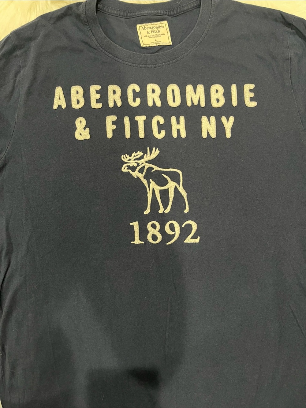 Vintage Abercrombie & Fitch NY Men's Navy Logo Tee